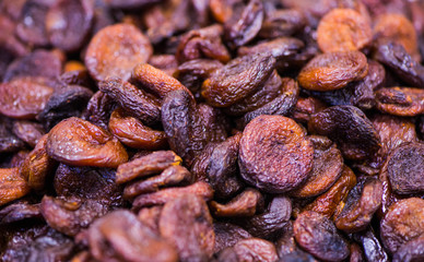 dried sweet fruits on market shelf closeup