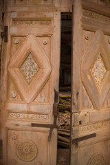 Antique wooden door, sharply beige color