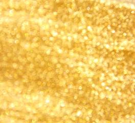 Abstract shining gold glitter bokeh background