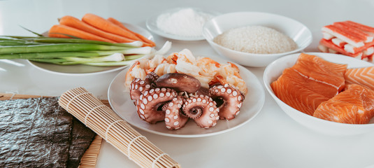nicely prepared seafood and vegetable ingridients for cooking sushi rolls  © Milena