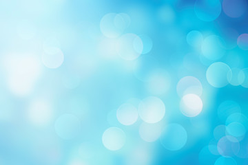 Obraz premium Blue blurred defocused background,abstract blur bokeh,glowing texture.