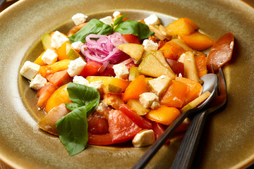 vegetable salad with tomato pear cheese onion basil