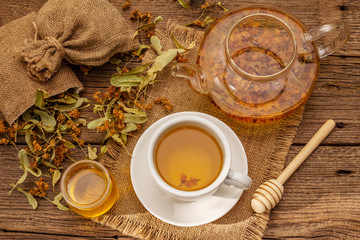 Linden tea. Dry fragrant flowers. Sunny morning breakfast. Hot drink to strengthen the immune system, alternative medicine