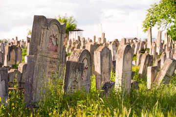 The Old Jewish cemetery at colorful sunset sky, Chernivtsi Ukraine.