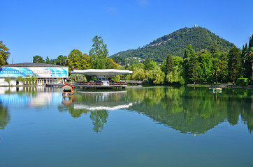 New Athos, Abkhazia. Pond and city park in sunny August day