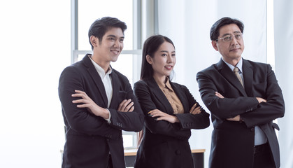 Portrait of business people standing and smiling