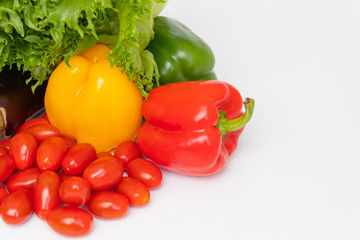 Obraz na płótnie Canvas Closeup vegetables on a white background. Healthy food concept. Copy space for text.