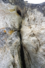 A grotto in the rock. Concept archaeology, geology, research and excavation.