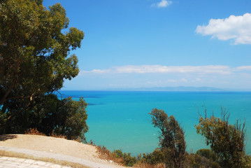 View from the observation deck on the azure sea, blue sea and mountains