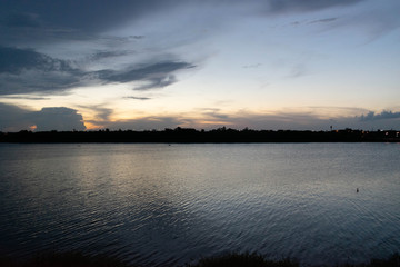 Obraz premium sunset over the river