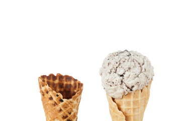 Cornets served with a scoop of ice cream; photo on white background.