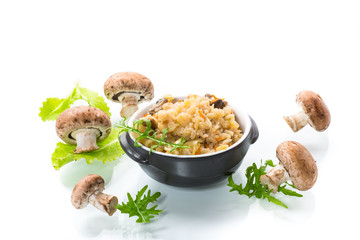vegetarian cooked rice with mushrooms in a ceramic bowl