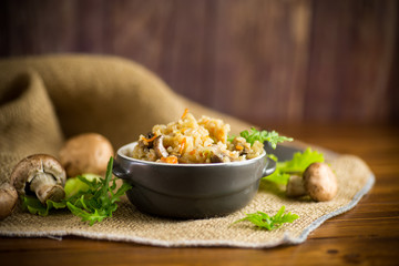 vegetarian cooked rice with mushrooms in a ceramic bowl