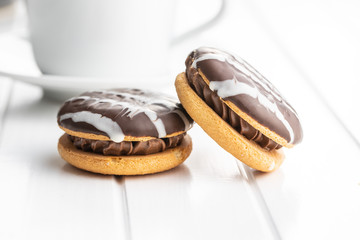 Sweet dessert with chocolate cream and chocolate icing