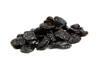Prunes, dry plums isolated on white background. Heap of dried fruits