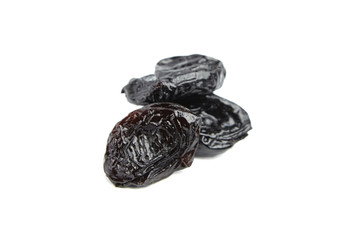 Prunes, dry plums isolated on white background. Heap of dried fruits