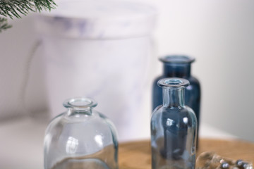 Obraz na płótnie Canvas Bottles for decoration. Glass small vase