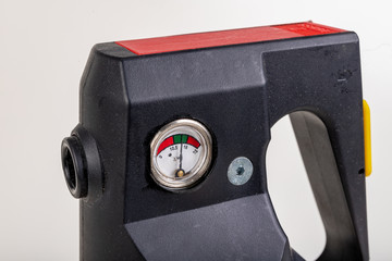 A small fire extinguisher to extinguish a fire in passenger cars. Fire accessories on the car