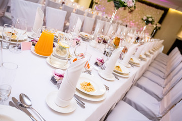 Elegantly covered wedding table, white tablecloth, Polish wedding