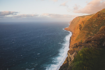 Fototapeta na wymiar Beautiful scenic sunset view on cliffs coast of Atlantic Ocean