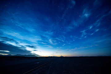 Naklejka na ściany i meble The nighttime skies just before sunrise in the Namib-Naukluft National Park