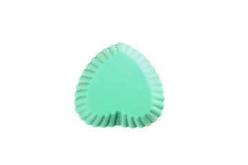Silicone heart shaped cookie baking dish isolated on a white background.