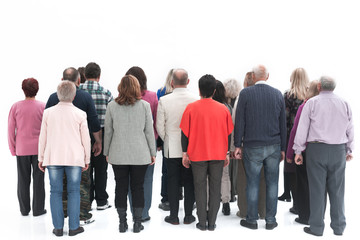Rear view of a casual group of elderly people isolated over a white background