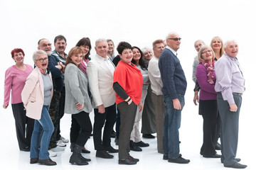 Group of cheerful mature people looking at camera