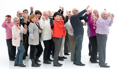 Group of people with their hands up