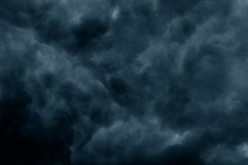 Fototapeta premium Stormy rain big fluffy clouds. Dark sky. Natural scenic abstract background. Weather changes backdrop. Sky filled with voluminous clouds.