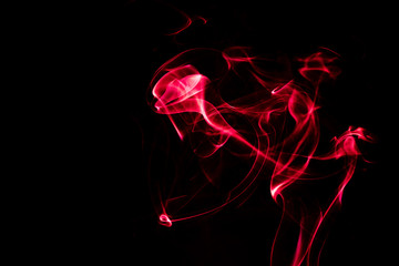 Fond texture abstrait fumée colorée rouge sur fond noir