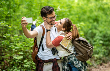 Hiker couple being cute together in a selfie