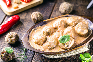 Vegetarian meatballs with white sauce of herbs and chopped vegetables. Meatless vegan food with organic products.