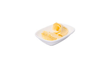 Butter.  Butter in white plate on white background. Breakfast menu.