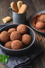 Tiramisu truffles covered in cocoa powder, easy and quick no bake dessert made from Mascarpone cheese, coffee and ladyfinger biscuits