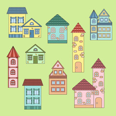 Colorful houses, isolate on a green background