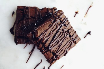 Chocolate Fudge Protein Bars isolated on white, selective focus