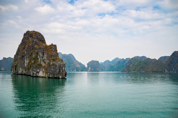 Halong Bay, Vietnam,  with limestone hills. Dramatic landscape of Ha Long bay, a UNESCO world heritage site and a popular tourist destination.