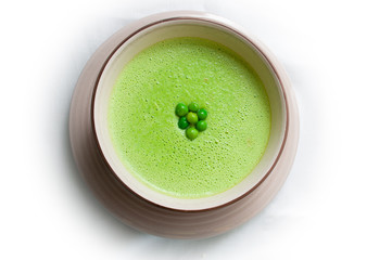 pea soup in a bowl on a white backgroud