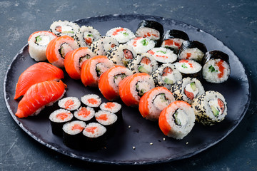 sushi set on a black table