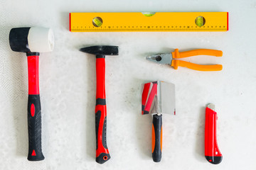 set of carpentry tools on a gray background top view. Worker carpenter table. Home repairs. The concept of the carpentry and woodworking industry