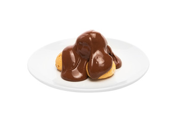 Profiterole - Profiteroles with flowing chocolate sauce
