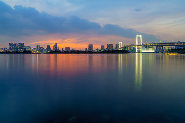 Sunset with city skyline and the Rainbow Bridge, Tokyo