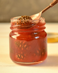 Jar of pine cone jam. Cold and cough treatment concept