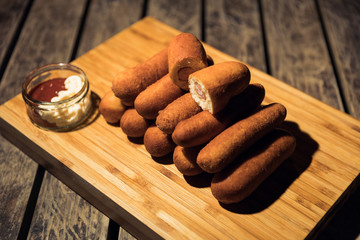 Isolated home cooked corn dogs