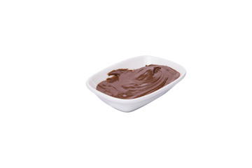 Chocolate cream. Chocolate cream in white plate on white background. Breakfast menu.