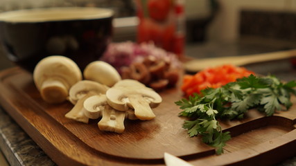 mushroom and vegetables prepared for healthy cooking, olives, onion, parsley