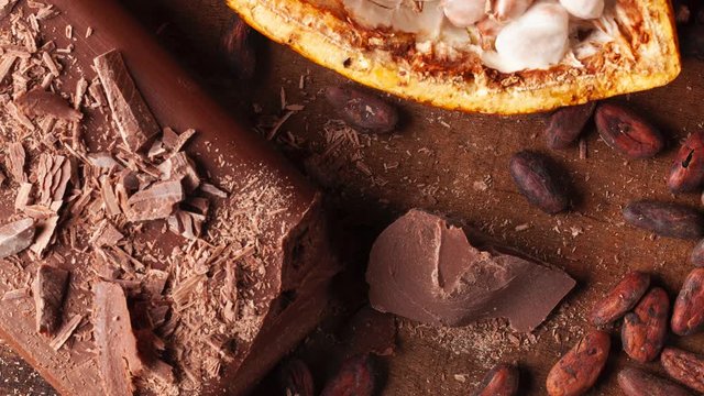 Fruit cocoa with chocolate pieces on a wooden table