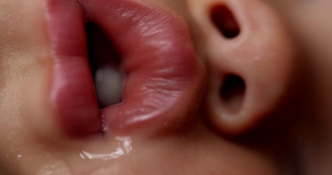 Baby lips macro close-up drooling sleeping. Toddler infant face detail closeup lips drool