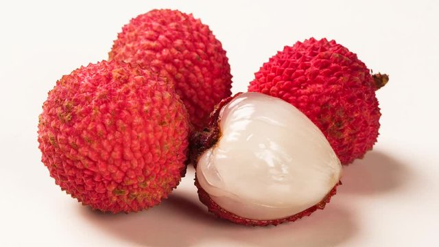 fresh lychees on white background.